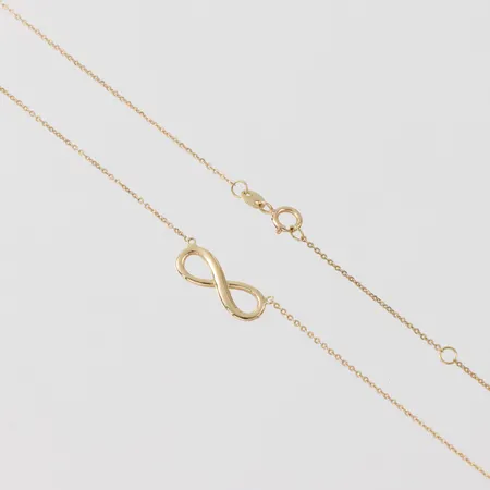 Collier, längd ca 43 cm, bredd 0.9 mm, 18k. Vikt: 1,6 g