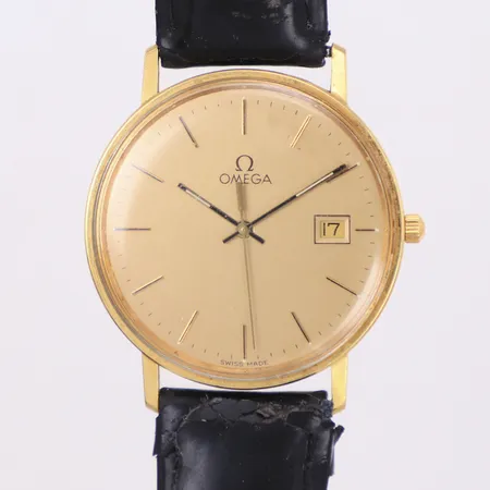 Herrur, Omega, 18K, quartz (går ej), 33,5mm, märkt tool 315, boettnr 1430, plexiglas med smärre repor, gravyr, slitet läderband ej original, inga tillbehör