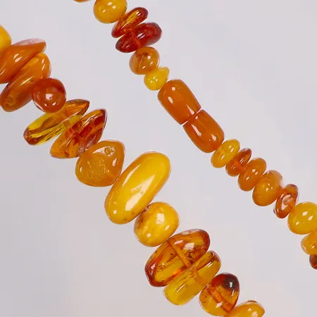 Collier med polerad Bärnsten 57cm bredd 8-24mm 