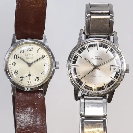 2st Herrur MOD och Mondia Graduate Ø 31-34mm, manuell uppdragning, skick: hårt slitage, MOD går men inte Mondia, stål och läder 