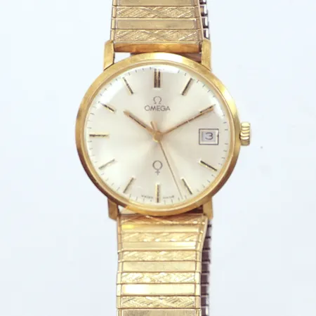 Herrur Omega Ø34mm, flexarmband i stål, mekaniskt, gravyr, 18k 54,3gr brutto Vikt: 54,3 g