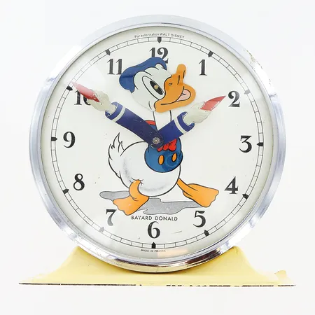 Väckarklocka Bayard Donald/Kalle Anka, made in France, höjd 12cm, bredd 12cm, fungerar ej, smärre skav och skevheter.