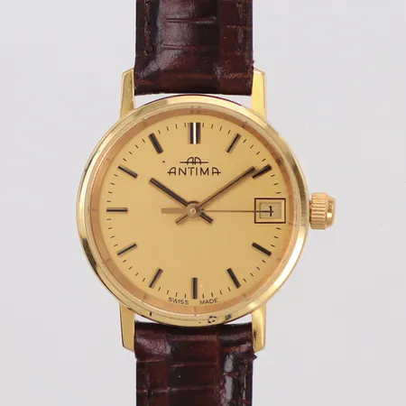 Damur, Antima, 18K, 22mm, quartz (går ej), datum, boettnr: 20560.4700.68, brunt läderband, box, gravyr på bakboett