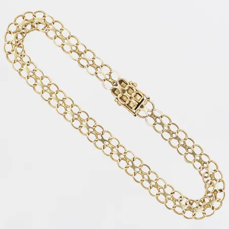 Armband X-länk, längd: 20,5cm, bredd: 8mm, bruksslitage, 18K guld.  Vikt: 7,9 g