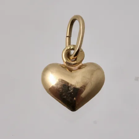 Hänge i 18K guld, Hjärta, mått 7,2x11,3mm, vikt 0,25g.