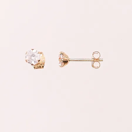 Ett par örhängen, 4mm, vita stenar, 18K 0,7g.