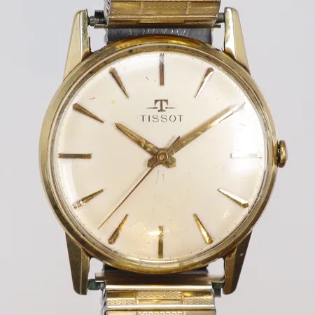 Herrur Tissot 14K Ø33,5mm boett nr N.41006/ 12006.11 snr. 5104725, cal. 731, ca år 1962, manuell uppdragning, repor och slitage, flexlänk, bruttovikt 56,9g