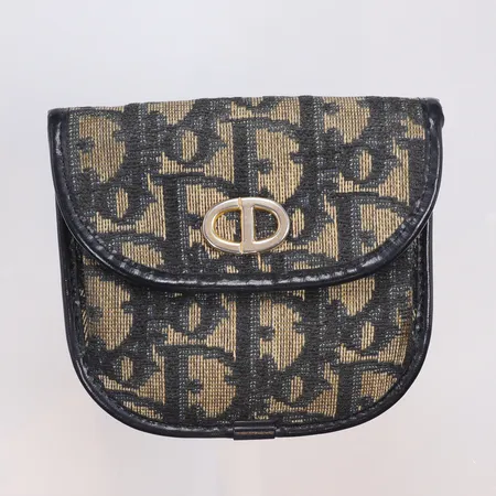 Portmonnä Christian Dior made in France, monogramcanvas, ca 17x26cm, defekt låsmekanism, visst slitage, ca 1980-tal 