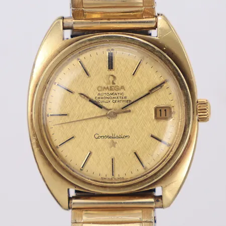 Herrur, Omega Constellation, Chronometer, C-shape, 35mm, guld på stål, automatisk, datum, Cal 564, boettnr CD 168 017 SP, verknr: 31425487, flexband, ca 1970, inga tillbehör
