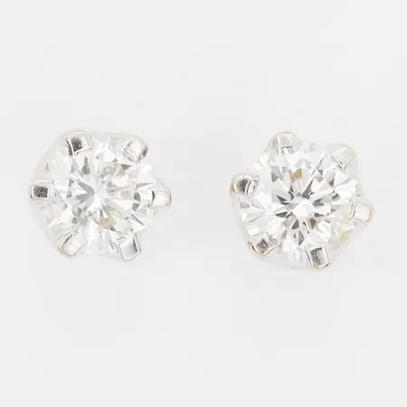 Ett par örhängen med briljantslipade diamanter, 2 x ca 0,15ct, kvalitet ca TW-W(G-H)/VS, stift, 18K vitguld Vikt: 1,1 g