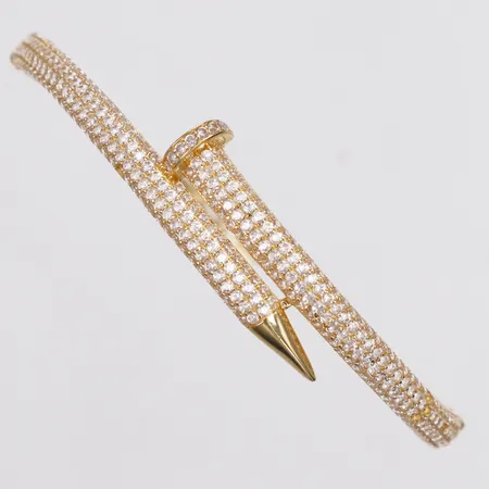 Armband, stelt, vita stenar, Øca59mm, bredd 2-11,5mm, OBS ej märkesdesign, skev, stenar saknas, bucklig, 18K  Vikt: 10,6 g