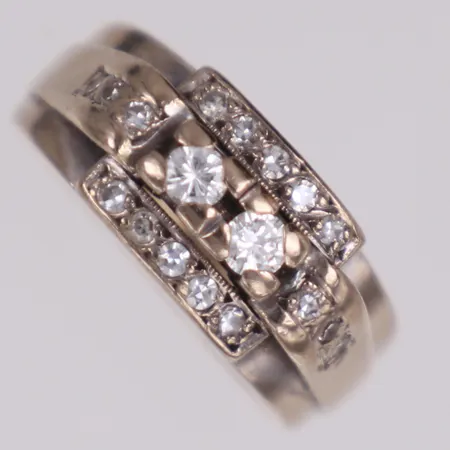 Ring diamanter 2x0,07ct, 16 x ca. 0,01ct, stl 15¾, bredd: 3,6-7,8mm, G. Dahlgren & Co, Malmö år 1985, vitguld, 18K Vikt: 6,1 g