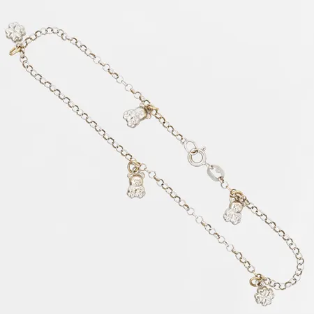 Vristlänk med fem berlocker, längd ca 25cm, 18K vitguld Vikt: 5 g