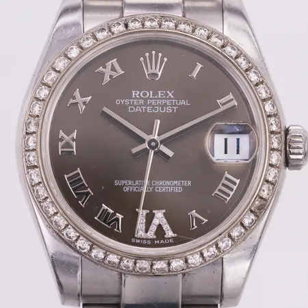 Damur, Rolex Oyster Perpetual Datejust, stål, automatisk, Ø31mm, referensnr 178274, serienr G207055, kalibernr 2235, verknr 2982499, diamantkrans, brun urtavla med diamanter på 6an, Oysterlänk ca 15cm, tillbehör saknas.