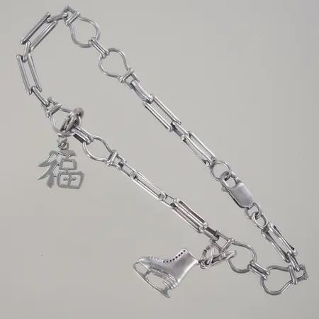 Armband med berlocker, längd 20 cm, bredd 3,8 mm, silver 925/1000 Vikt: 9,6 g