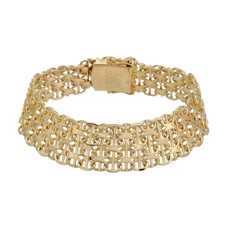 Armband X-länk, 18K guld, Jo-Ans Guld AB (J&A), Köping, svensk kontrollstämpel, längd knäppt 19,0 cm, bredd 15 mm, en tom ögla med plats för berlock, fint skick Vikt: 34,9 g