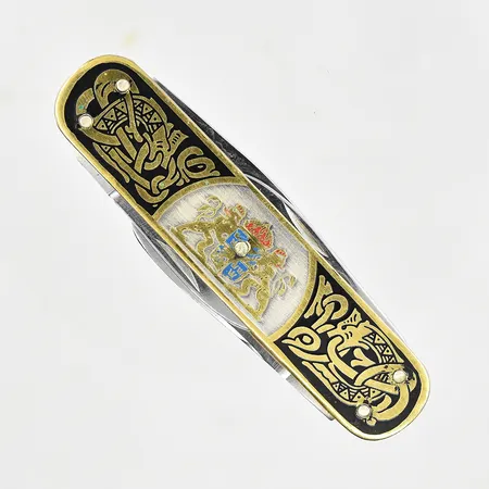 Fickkniv, stora Riksvapnet och B.K.Biet, längd 7½ cm, bredd ca 25 mm, metall.