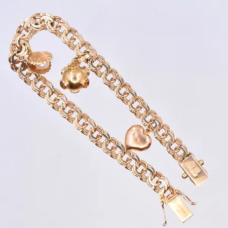 Armband Bismarck med berlocker, längd 19 cm, bredd länk 7 mm, 18K. Vikt: 21,2 g