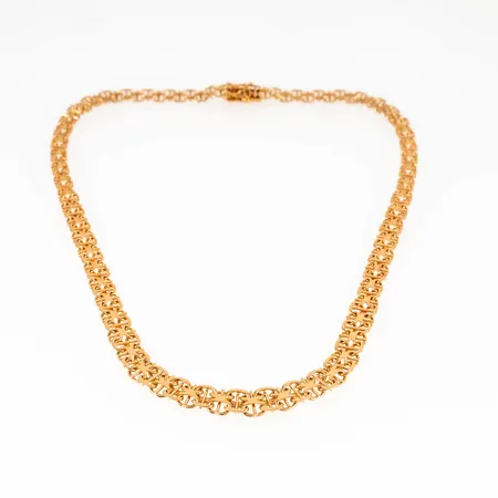 Colliér, X-länk med stav i 18K guld. Det är 43,5 cm långt, 5 - 9,2 mm brett och väger 25,4g. Kistlås. Fint skick. Stämplad L9 (1961), BHG, 18K & kattfot.