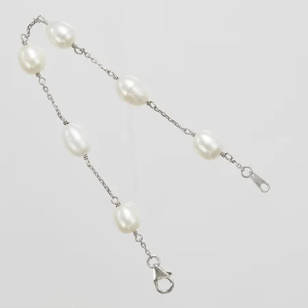 Silverarmband, odlade sötvattenpärlor med ytdefekter, längd: 19,5cm, bredd: 1,3-8,2mm, rodierat, 925/1000 Vikt: 7,3 g