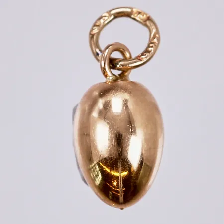 Hänge, längd: ca 1,1cm, bredd: ca 5mm, 18K  Vikt: 2 g