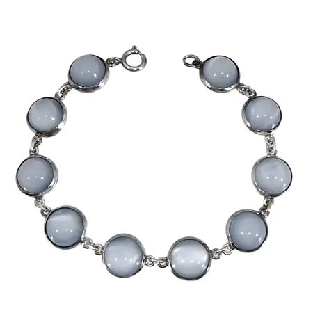 Retro Armband, silver, Månstensliknande stenar, Mattson & Olsson (MaO), Malmö 1960, längd 18,5 cm, bredd 12 mm, tjocklek 6,5 mm, en sten med tunn sprickbildning, för övrigt i fint skick  Vikt: 20 g