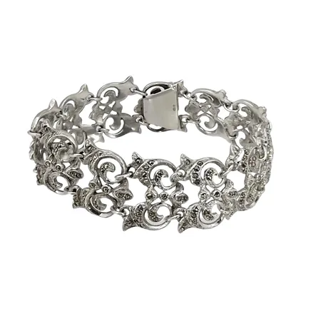 Vintage Armband, silver 830/1000, Markasiter, längd 18,5 cm, bredd 20,5 mm, svensk kontroll/importstämpel, en sten saknas, för övrigt i fint skick Vikt: 29,6 g
