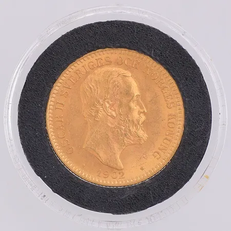Mynt Mynt, Oscar II Sverige och Norges Konung 1902, nominellt värde 20kr, Ø23mm, 21,6K. I plastetui. Vikt: 9 g