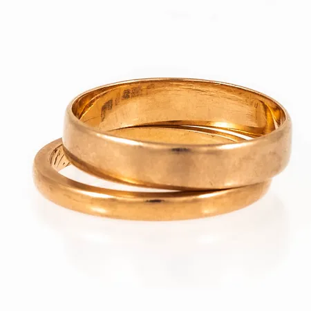 Graverat guld i 18K. Vikt: 5,0g. 