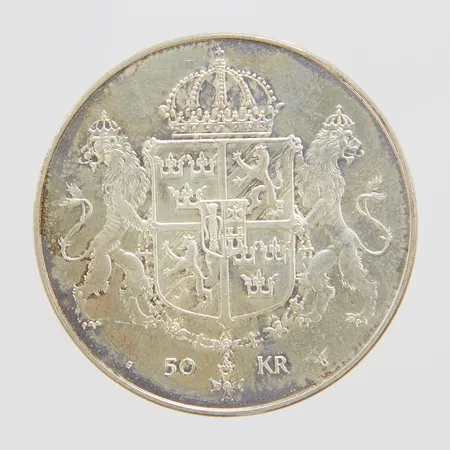 Minnesmynt, Ø36mm, Det Kungliga bröllopet, Konung Carl XVI Gustaf Drottning Silvia 19 Juni 1976, nominellt värde 50kr, Sveriges Riksbank, silver 925/1000 Vikt: 27,1 g