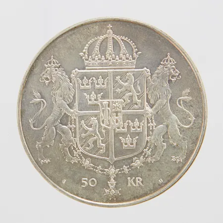 Minnesmynt, Ø36mm, Det Kungliga bröllopet, Konung Carl XVI Gustaf Drottning Silvia 19 Juni 1976, nominellt värde 50kr, Sveriges Riksbank, silver 925/1000 Vikt: 27,1 g