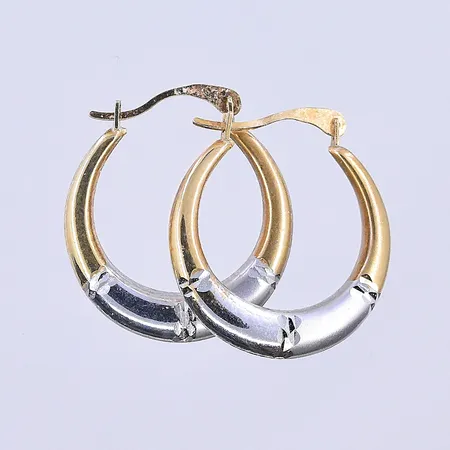 Ett par örhängen, Ø13 mm, vitguld/gulguld, 18K. Vikt: 1,5 g