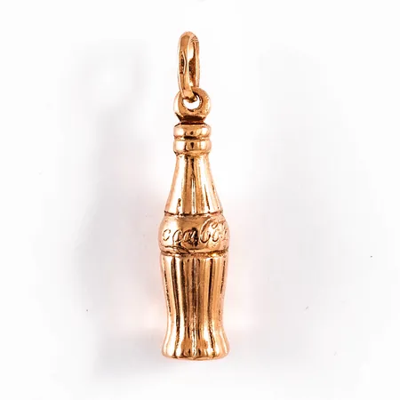 Hänge, Coca Cola flaska i 18K guld. Den är 6,5 mm bred, 30,5 mm lång och väger 1,6g. 