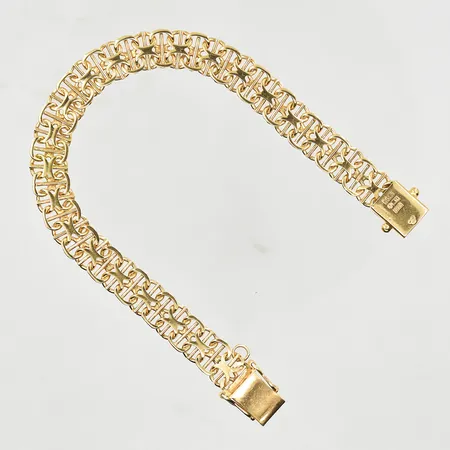 Armband X-länk med stav, längd 19 cm, bredd 10 mm, 18K. Vikt: 19,3 g