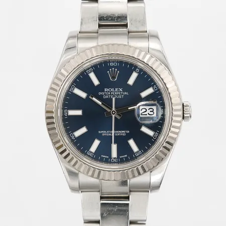 Herrur Rolex Oyster Perpetual Datejust II,automatisk, stål, ref-nr: 116334, serie-nr: A514G064, boett-nr: 2410, verk-nr: H56V689, kaliber: 3136, vitguldsring, Ø41mm, blå urtavla, safirglas, viklås, oysterlänk, 14st oysterlänkar monterade, certifikat från Nymans UR år 2014, manual, bruksslitage, repor på länk, boett med mindre repor, delvis defekt garantihållare, box, ytterkartong.  Vikt: 0 g