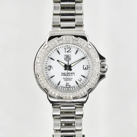 Damur Tag Heuer Formula 1, boett Ø35 mm, quartz, stål, diamantkrans 0,75ctv, refnr WAC1215.BA0852, boettnr ERT3716, cert daterat 2009-11-16, diamantcertifikat, låser hårt, behov av batteribyte, box. Vikt: 0 g