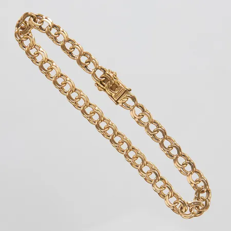 Armband, Bismarck, längd: 20,6cm, bredd: 5,9-6mm, slitna länkar intill lås, svenska stämplar, 18K Vikt: 14 g