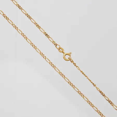 Kedja, figaro, längd: ca 48,8cm, bredd: 1,8-2,1mm, ojämnheter längs länk, skev ändögla, UnoAErre, 18K Vikt: 5,8 g