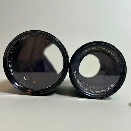 2 Objektiv Expert, 200mm, f 3,5.UV filter, för Konica, analog, lock, Konica Hexanon AR, 135mm, f 3.5, analog, lock Vikt: 0 g
