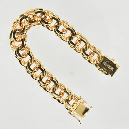 Armband Bismarck, längd 19½ cm, bedd 15 mm, 18K. Vikt: 87,7 g
