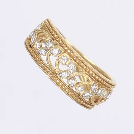 Ring med diamanter 20x ca 0,01ct, st 17¼, bredd 3-8mm, 18K Vikt: 4 g