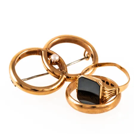 Diverse defekt/graverat guld i 18K. Vikt: 22,3g. 