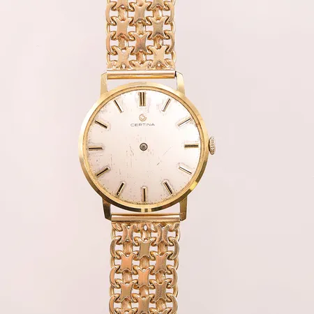 Herrur Certina 18K, 33,5mm, saknar glas, defekt, band i 18K, bruttovikt 76,5g.