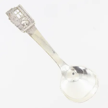 Serveringssked 143mm, dekor av flicka och julgran, gravyr, silver 830/1000.  Vikt: 33,3 g