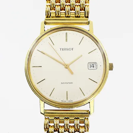 Herrur Tissot, 18K, quartz, Ø34mm, datum, sekundvisare, fungerar ej, gravyr, länk i gulmetall 19,5cm, bruttovikt 78,5g, inga tillbehör.