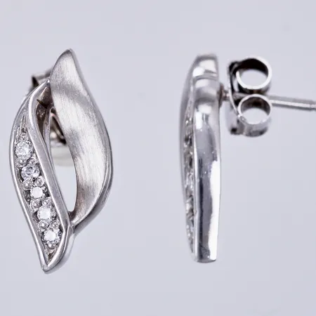 Ett par örhängen med vita stenar, Esprite, längd: ca 1,3cm, bredd: ca 4-5mm, 925/1000, silver och förgyllt silver Vikt: 2,8 g