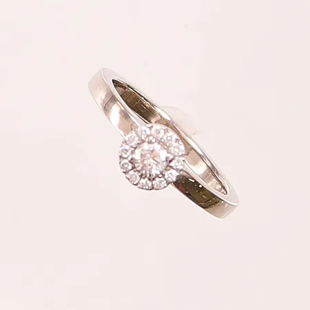 Ring, diamanter (1x ca 0,17ct + 12x ca 0,01ct), Ø17¾, bredd:2-7mm, 18K 5g.