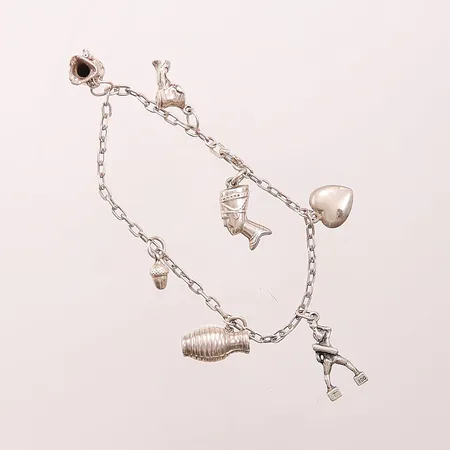 Armband med 7 berlocker,stl 17cm.830/1000 Silver 11,5g 