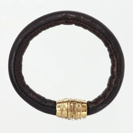Armband Dyrberg/Kern, innermått 17cm, bredd10mm, vita stenar i gulmetall, skinnimitation, originaletui  Vikt: 0 g