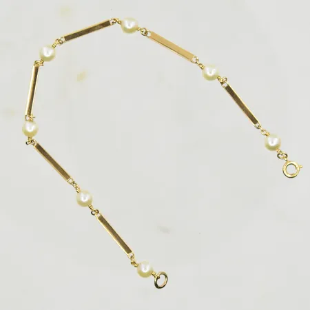 Armband med pärlor Ø5 mm, längd 18½ cm, länkens bredd 2 mm, 18K. Vikt: 3,8 g